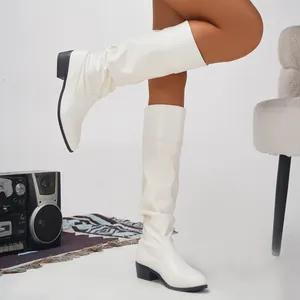 Elegant white slouchy knee-high boots with pointed toe and comfortable block heel
