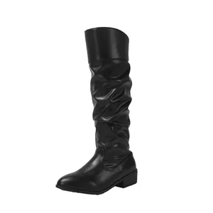 Elegant black pointed toe slouchy thigh-high boots with comfortable mid block heel.