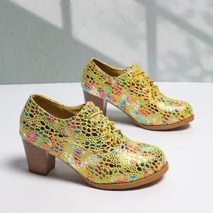 Detail view of colorful metallic patterned lace-up chunky heel shoes for women
