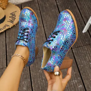Colorful iridescent chunky heel lace-up pumps with a vibrant metallic spot pattern detail