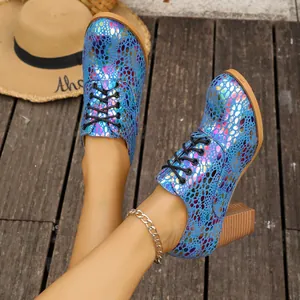 Chunky blue scale-patterned lace-up high heel shoes for women outdoors
