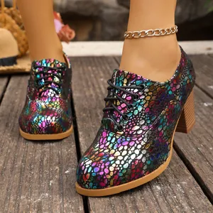 Detail of colorful pebbled pattern on chunky heel lace-up women's oxfords
