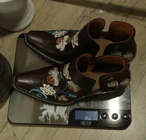 Detailed weight measurement of vintage embroidered western ankle boots for women