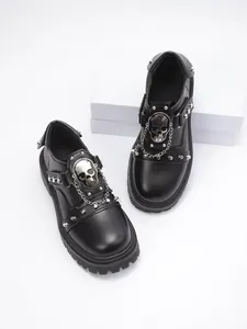 Gothic black platform loafers featuring silver skull charms, chains and metal studs details.