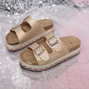 Elegant gold platform slide sandals with double buckles and colorful braided sole details