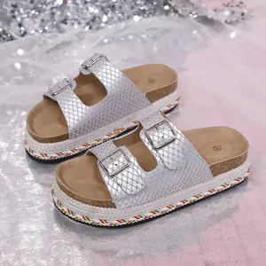Silver metallic double buckle platform sandals with cork footbed and braided sole detail