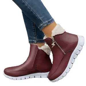 Women's wine red winter snow boots featuring warm fleece lining and side zipper detail