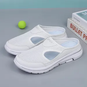 White breathable mesh slip-on mules with thick sole and hollow-out side detail