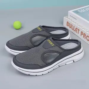 Detailed view of grey mesh breathable slip-on casual sandals with white thick soles