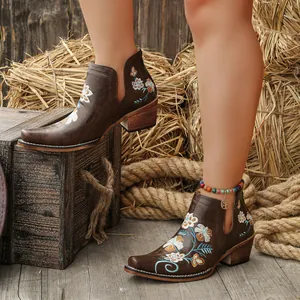 Vintage western women's ankle boots with intricate floral embroidery and block heel