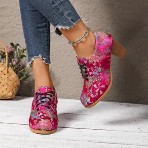 Vintage style pink satin floral embroidered ankle boots with chunky high heels and laces