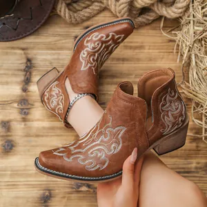 Vintage brown western ankle boots with white floral embroidery and V-neck opening