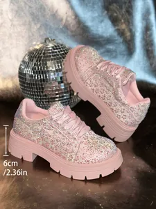 Detail of pink rhinestone platform sneakers with 6cm thick sole measurement