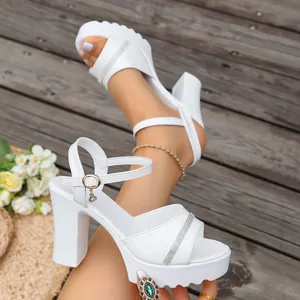 White chunky high heel platform sandals with rhinestone strap and ankle buckle detail