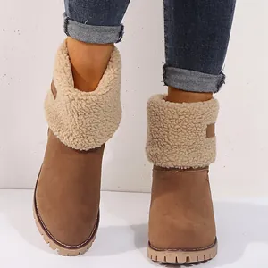 Women's brown winter snow boots with warm fleece lining and thick chunky lug sole