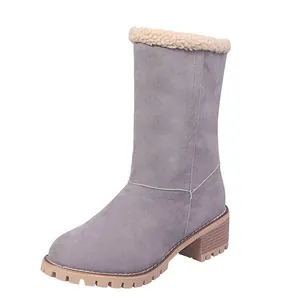 Stylish grey mid-calf snow boots featuring warm sherpa lining and a chunky heel design