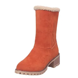 Stylish orange mid-calf snow boots with fleece trim and chunky heel for winter