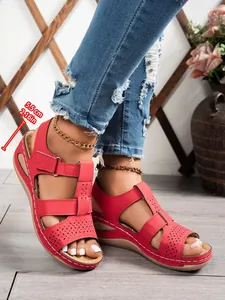 Red platform wedge sandals with contrast stitching and 5.5cm heel height detail