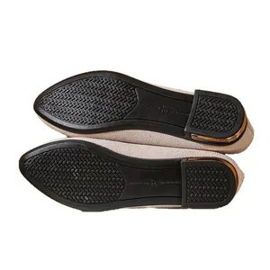 Classic beige pointed-toe flat shoes with non-slip sole and gold heel detail.