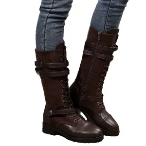 Elegant brown leather and suede patchwork knight boots with decorative buckle straps