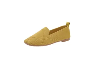 Close-up detail of mustard yellow flyknit flat loafer showing textured knit pattern