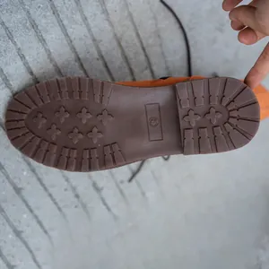 Close-up of brown anti-slip rubber sole for women's western knight boots showing size 38