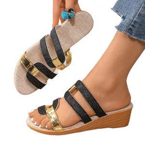 Women's stylish wedge sandals with black glitter and gold straps for summer beach