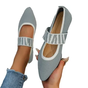 Breathable pointed-toe fly-knit flats for women featuring a stylish patterned elastic strap
