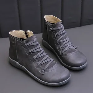 Dark grey women's flat lace-up ankle boots featuring side zipper and wave stitching