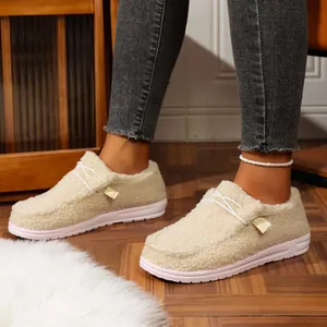 Detail of women's cream fuzzy loafers with warm fleece lining and comfortable soles
