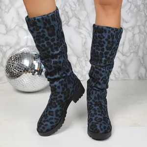 Close-up of blue leopard print slouchy boots with chunky soles for women's winter fashion
