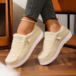Close-up view of cozy women's platform loafers with warm fleece lining for winter