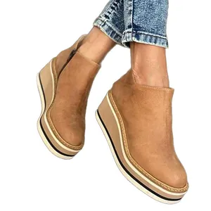 Stylish women's wedge platform ankle boots with side zipper in tan faux leather