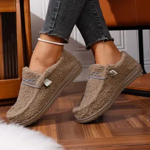 Detailed side view of cozy brown faux fur platform loafers showing warm fleece lining