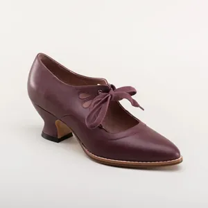Elegant burgundy lace-up high heels with teardrop cutouts and vintage leather finish