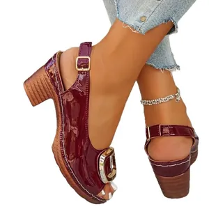 Women's burgundy patent leather open-toe sandals with chunky heels and metal buckle