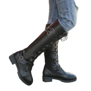 Women's black knee-high motorcycle boots with decorative buckles and side zipper