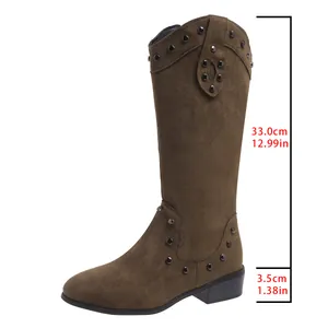 Detailed view of brown suede western cowboy boots with heel and shaft height measurements