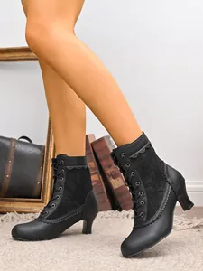 Bottines à lacets noires élégantes avec empiècements en dentelle et talons aiguilles