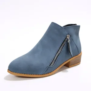 Elegant blue suede-like pointed toe ankle boots with side zipper and chunky heel