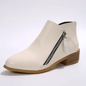 Elegant cream faux leather ankle boots featuring pointed toe and side zipper detail