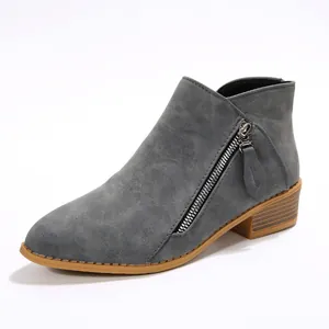 Stylish grey pointed toe block heel ankle boots for women featuring a side zipper