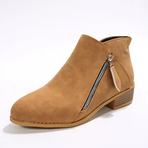 Women's classic tan suede pointed toe ankle boots featuring chunky heel and side zipper