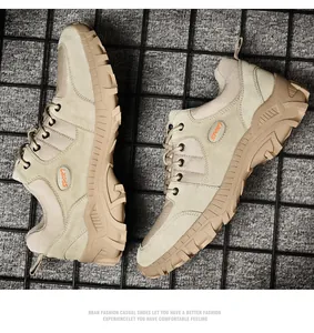 Macro detail of men's khaki outdoor hiking shoes featuring durable non-slip soles