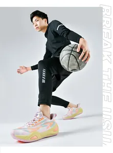 Dynamic shot of colorful basketball shoes worn during athletic basketball play.
