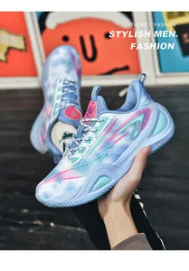 Side view of blue breathable mesh basketball shoes featuring stylish pink patterns.