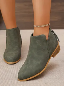 Stylish chunky low heel olive green ankle boots featuring pointed toe and back zipper tassel