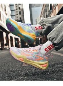 Dynamic close-up of breathable multi-color mesh basketball shoes for outdoor sports activities.