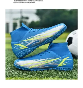 Detailed view of blue high-top flyknit soccer shoes positioned on a grass field