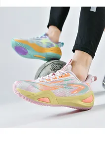 Breathable mesh basketball shoes featuring a colorful design shown in an action sports shot